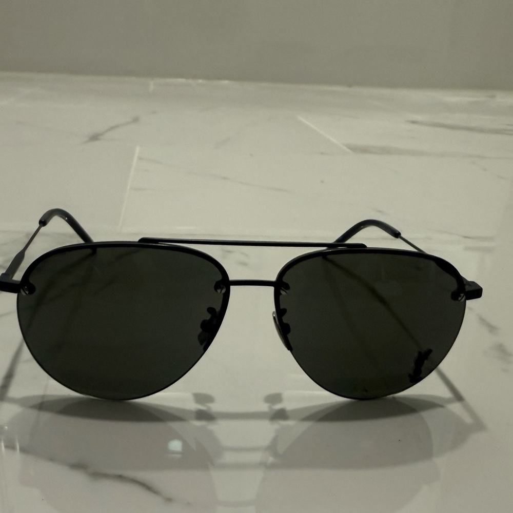 Yves Saint Laurent Black Frame Sunglasses with Dark Lenses